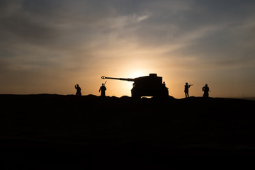 War Concept. Military silhouettes fighting scene on war fog sky background, World War Soldiers...