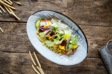 Top view on poke dish with unagi eel with rice