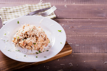 risotto with mushrooms, fresh herbs and parmesan cheese. Tasty and healthy vegetarian lunch