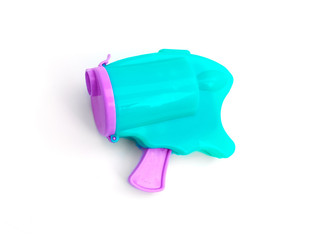 Colorful pink and blue popper party confetti bullet gun, isolated on white.