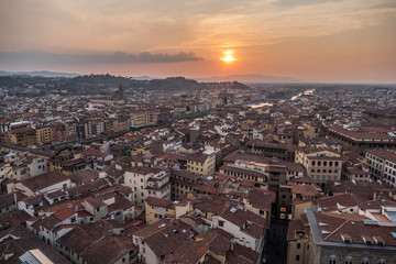 Aerial view of Florence at sunset with Arno river in background