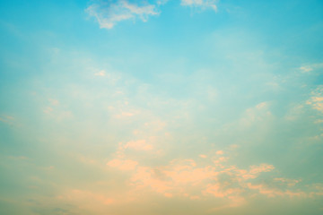 Beautiful sky with cloud before sunset. Colorful sky in twilight background. Bright Blue, Orange And Yellow Colors Sunset.