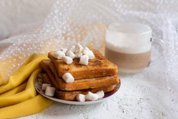 French bread toast. French bread toast with marshmallows and coffee
