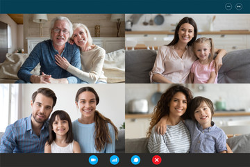 Screen application view of diverse happy relatives sit rest at home on quarantine talk chat on...