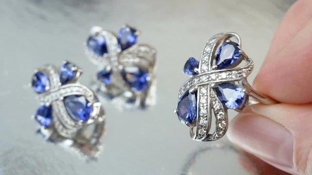 jeweler looking at beautiful ring, jewerly inspect and verify, pawnshop concept, jewerly shop concept