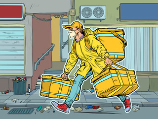 city street. courier in a medical mask. food delivery during the epidemic