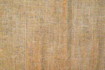 Brown sackcloth texture. or Background of Natural Brown Fabric Sack weaving is a bag. Vintage abstract Hessian or sackcloth fabric or hemp sack texture background.