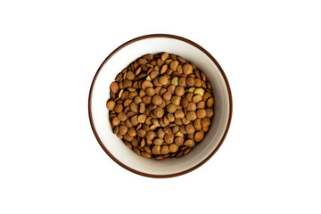 Green lentils in bowl isolated on white background