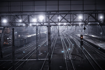 railway tracks night landscape at the railway station fog autumn