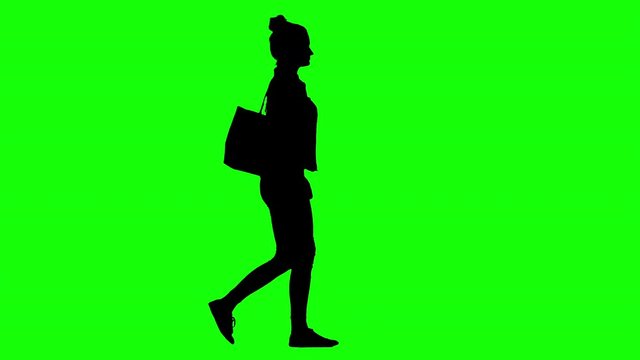 Elegant Woman Walking Green Screen Silhouette With Purse Hanging on Her Shoulder