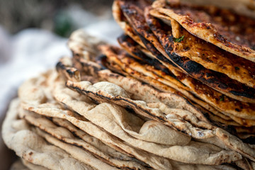 Preparation of organic tandoor bread and layered bread, one of the local flavors of Antioch