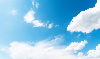 Beautiful blue sky and close-up white clouds.  Nature background.