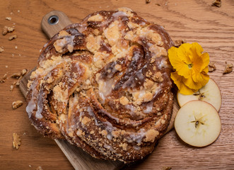 yeast homemade bun with crust and frosting