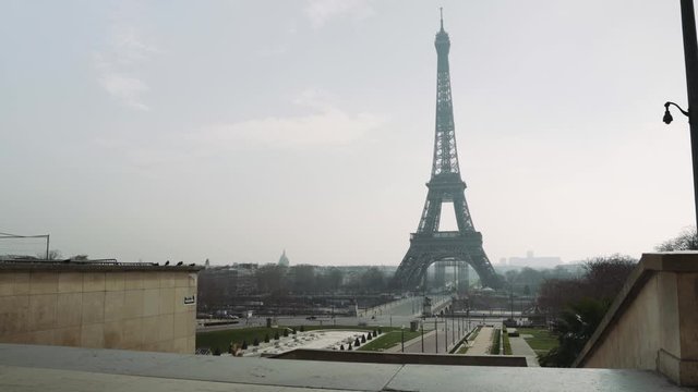 Paris, France / 04 13 2020: Deserted Eiffel tower area during coronavirus lockdown in Paris 4K
