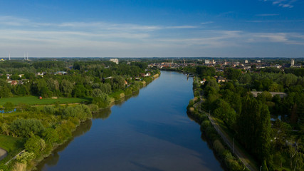 Aerial view of the Scheldt river, in Grembergen, Belgium