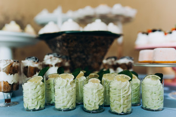 Candy Bar. Delicious sweet buffet with cupcakes. Sweet holiday buffet with cupcakes