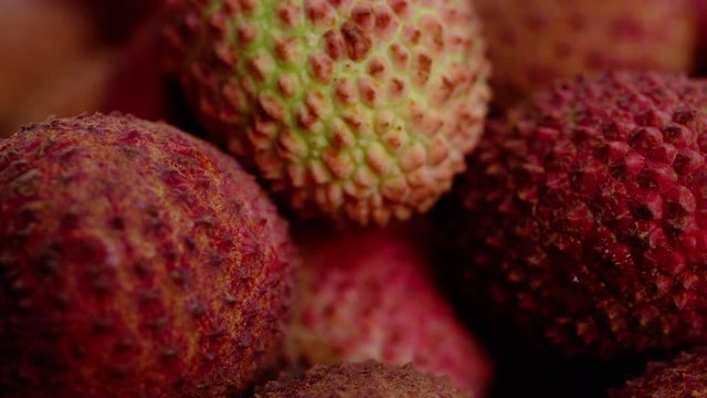 4k Close up ,dolly shot of red exotic Chinese lychee fruits 
