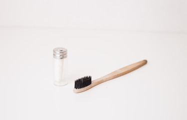 zero waste dental floss and bamboo toothbrush