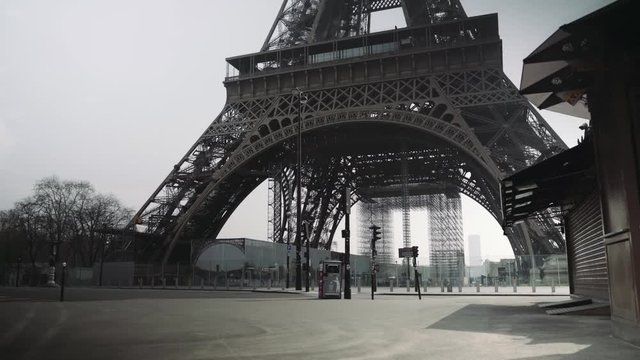 Paris, France / 04 13 2020 : Deserted Eiffel tower during coronavirus / Covid-19 lockdown in Paris, france 4K