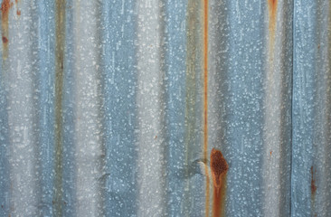 old aluminium wall with rusty use for background design