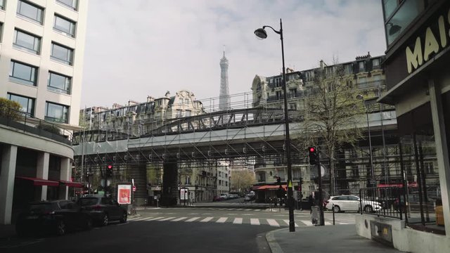 Paris, France / 04 13 2020: Quiet street near Eiffel tower during coronavirus / Covid19 lockdown in Paris, France