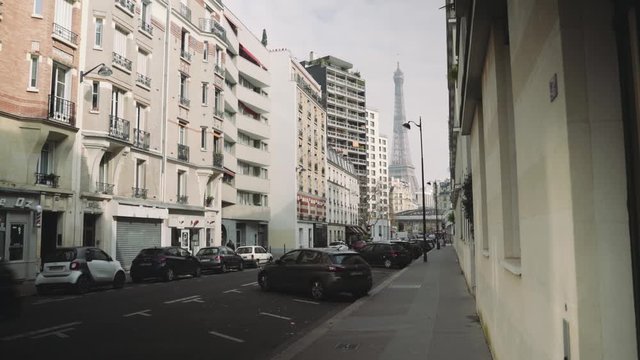 Paris, France / 04 13 2020: Deserted street near Eiffel tower during coronavirus / Covid19 lockdown in Paris, France