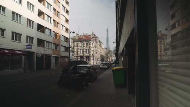 Paris, France / 04 13 2020: Deserted street near Eiffel tower during coronavirus / Covid19 lockdown in Paris, France 4K