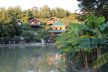 Obraz premium Houses for fishermen on the lake Achigvara in Sochi.