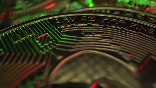 Bitcoin. Many coins in the green and red light. May. Halving of currency. BTC, eth, zec, eos and another coins. Gold coin. After trading.