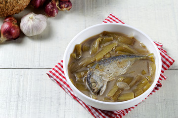 Thai Coconut Curry of Steamed Mackerels and Lotus Stems (gaaeng gathi saai buaa bplaa thuu neung)