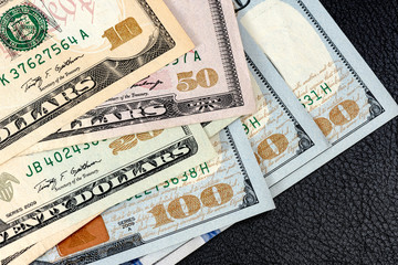 Fototapeta na wymiar Many american dollar banknotes. Symbolic photo for debt and wealth.