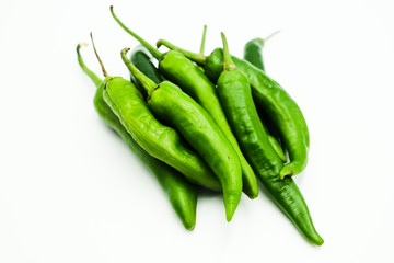 Green Chili or peppers or Capsicums , shots on isolated white background.