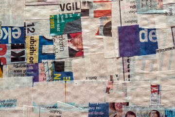 Background of torn newspaper pieces