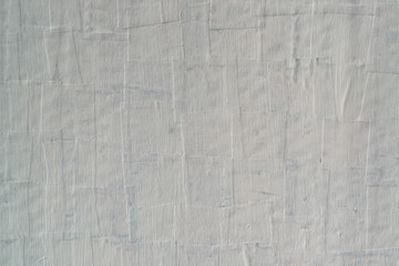 The texture of the paint is white. Wall background