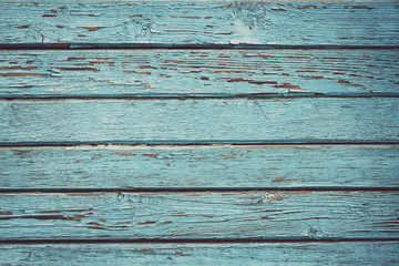 Peeling paint on wooden fence, plank texture, timber background. Old wood painted floor. Desk...