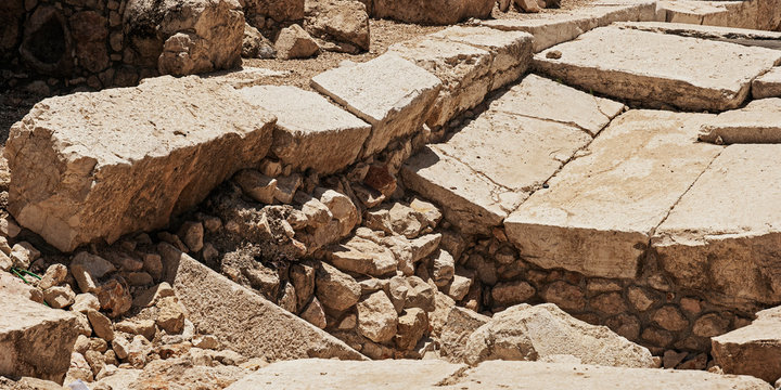 closeup detail of the dressed stones of the herodian roman street next to the ancient western wall kotel of the second temple in jerusalem