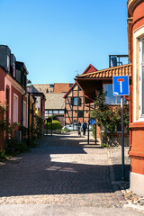 Fototapeta na wymiar Typical architectural street scene from the small Swedish city Ystad in south Sweden.
