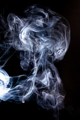 Fototapeta na wymiar Smoke motion on black background.