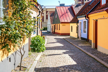 Fototapeta na wymiar Typical architectural street scene from the small Swedish city Ystad in south Sweden.