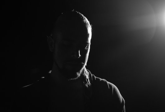 Portrait of a man on a dark background