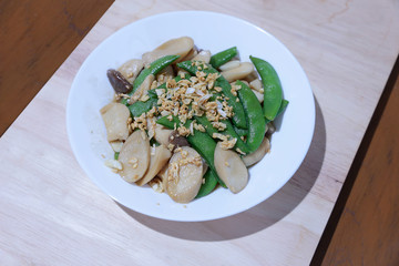 Mushrooms Stir Fried with Oyster Sauce on white plate.