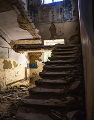 Obraz premium Old ruined haunted house, abandoned house. The lost city of Pripyat. Modern ruins. Chernobyl - image.