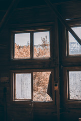 large broken window in an old destroyed building. Old ruined haunted house, abandoned house. The lost city of Pripyat. Chernobyl - image