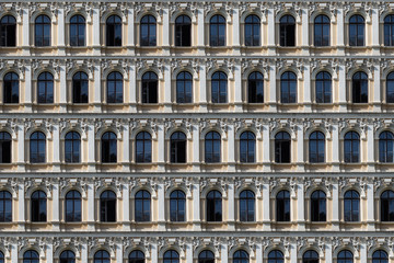 Facade with stucco and figures of the last century