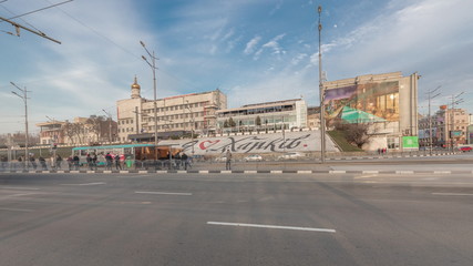 Panoramic view to Sergiyevsky Square and city crossroads with cars traffic and tram stop timelapse, Kharkiv, Ukraine