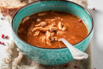 Tasty tripe soup made of vegetables and red peppers
