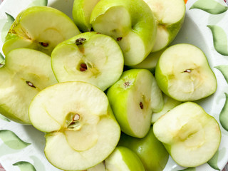 Fresh ripe green apples as background, close-up view