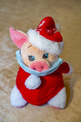 Cute soft baby toy in antibacterial mask against the virus