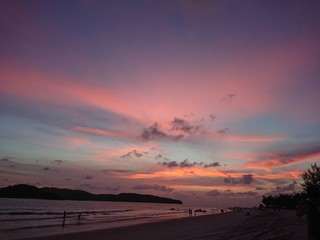 sunset on the beach with violet sky