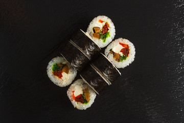 Japanese food: Set of salmon sushi and rolls with salmon and eel